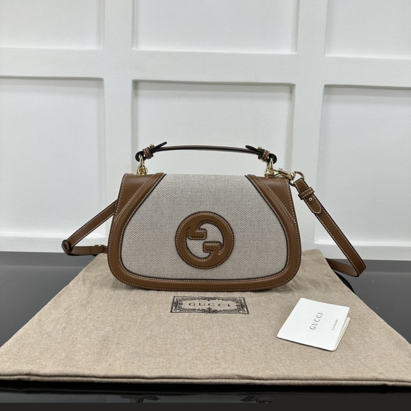 G*u*i top handle bags
